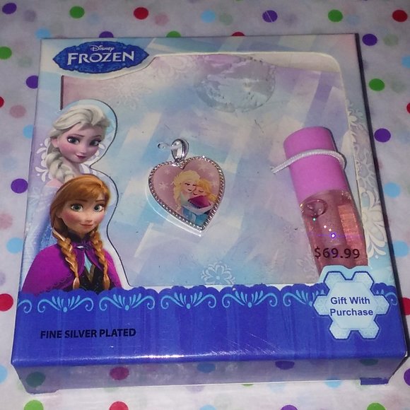 Disney Other - DISNEY FROZEN ELSA & ANNA 'STRONG BOND STRONG HEART' SILVER PENDANT/LIP GLOSS